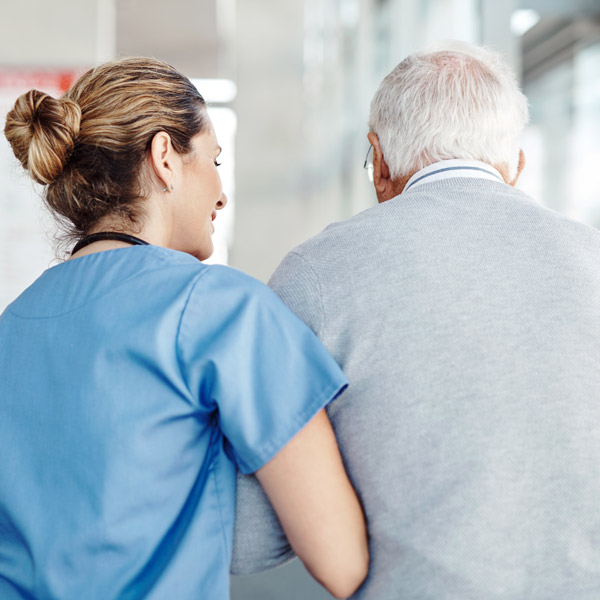 caretaker with elderly man